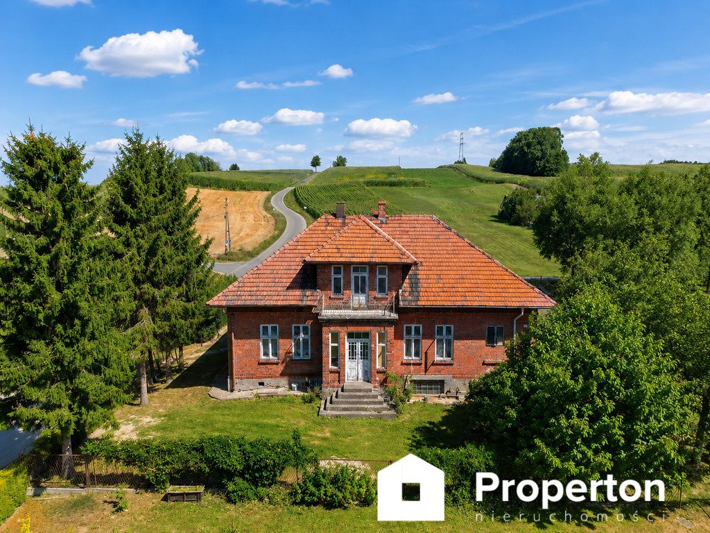 Do sprzedania przestronny dom z działkami 3231 m² w Tłuczańiu Tłuczań  150m2 Foto 1