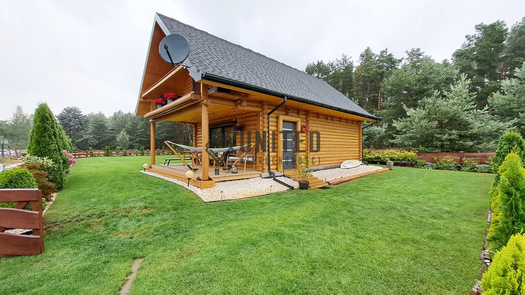 Na sprzedaż urokliwy dom z bali nad jeziorem z własnym pomostem Tarnów Jezierny  125m2 Foto 1