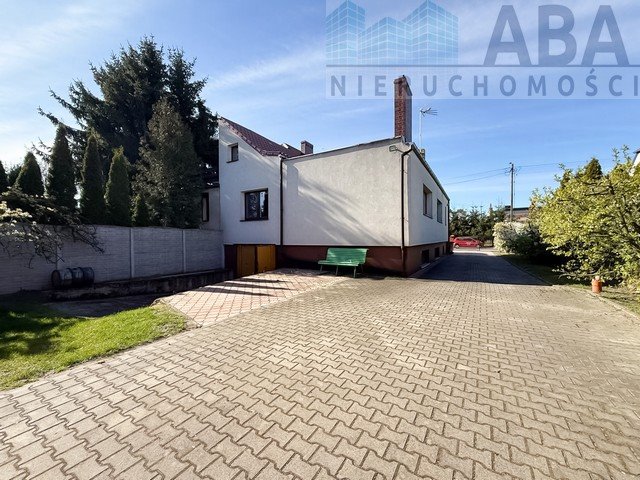Przestronny dom z 2 garażami, kominkiem i dużą działką Strzałkowo, Andrzejewskiego 3  116m2 Foto 1