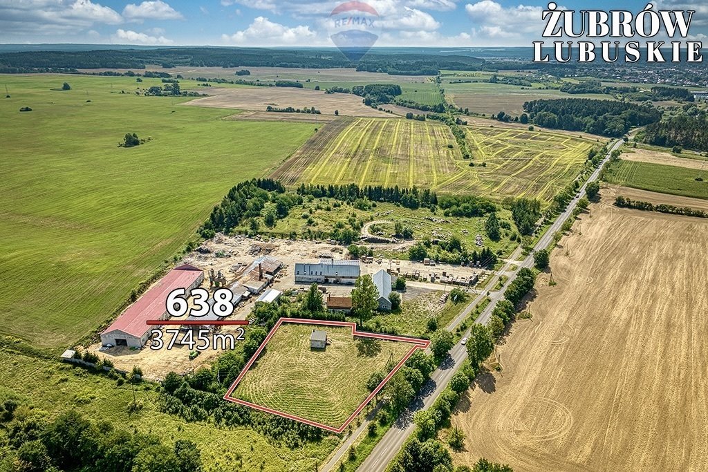 Działka inwestycyjna 3 745 m² z budynkiem i pełnym uzbrojeniem Żubrów  3 745m2 Foto 1