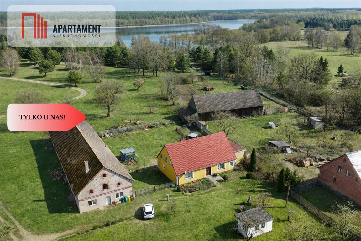 Do sprzedania dom z 2 mieszkaniami i ogrodem w Ostrorogu Ostroróg  135m2 Foto 1