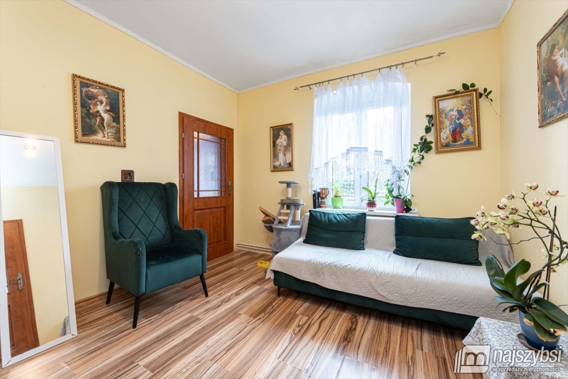 Polecam 3-pokojowe mieszkanie z garażem i ogródkiem w Płotach Płoty, Miasto  63m2 Foto 1