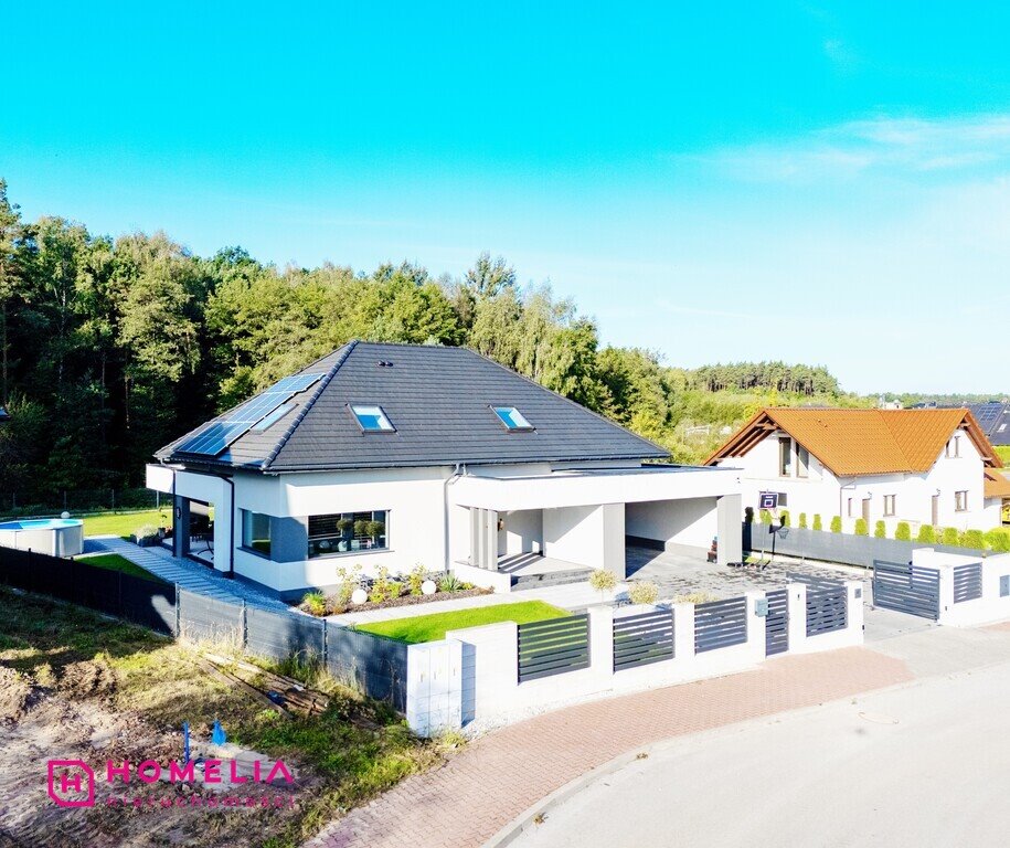 Nowoczesny dom z dużym tarasem i widokiem na las Bilcza  243m2 Foto 1