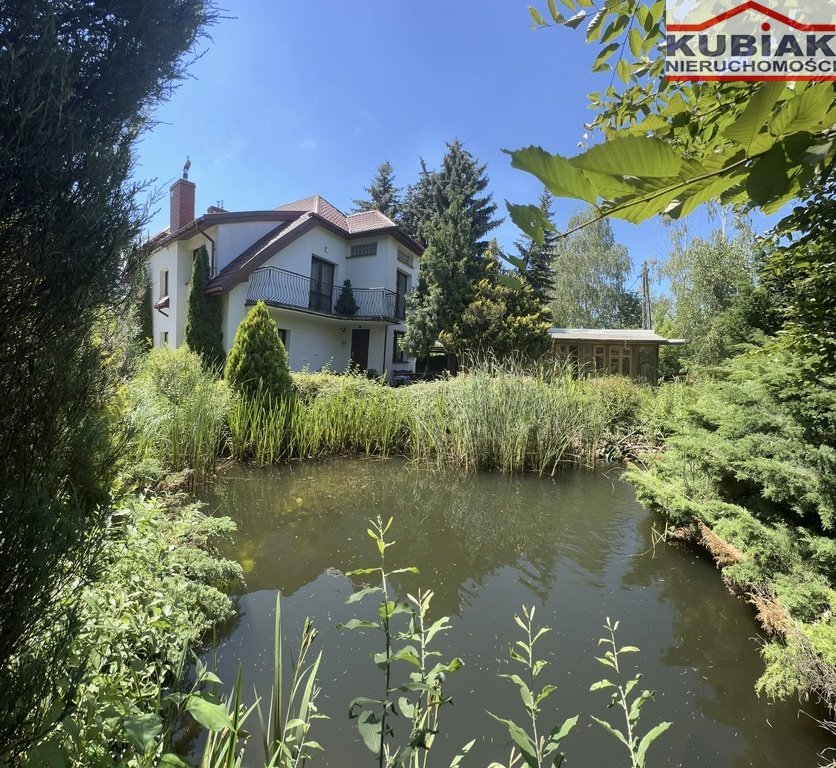 Przestronny dom z 3 mieszkaniami, ogrodem i szklarniami Reguły  248m2 Foto 1