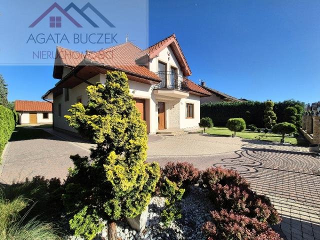 Elegancki dom 200 m2 z ogrodem, garażem i tarasami Marcinkowice  200m2 Foto 1