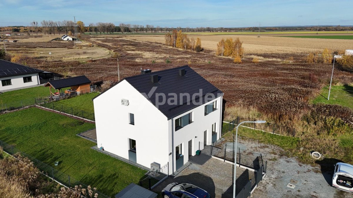 Nowoczesny bliźniak z dużym ogrodem i ogrzewaniem pompa ciepła Ligota  84m2 Foto 1