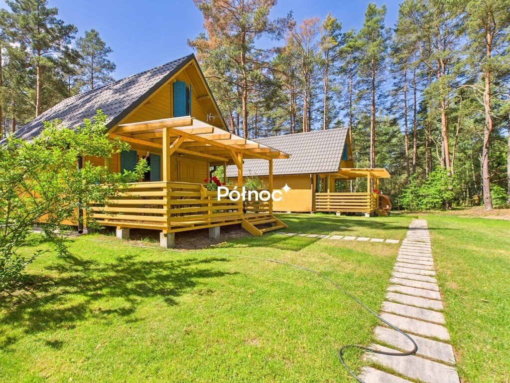 Ośrodek wypoczynkowy z 6 domkami, jezioro 250 m Narty, Spacerowa  4 812m2 Foto 1