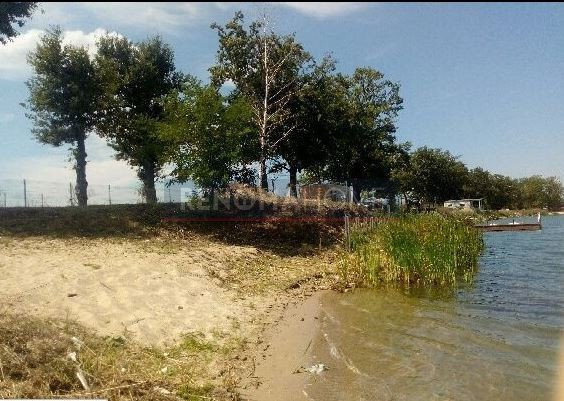 Zapraszam do zakupu działki nad jeziorem z własną plażą Spalona  1 295m2 Foto 1