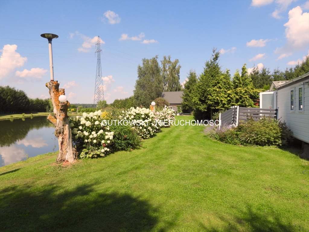 Zapraszam do domu z 3 obiektami letniskowymi i stawem rybnym Karolewo  52 097m2 Foto 1