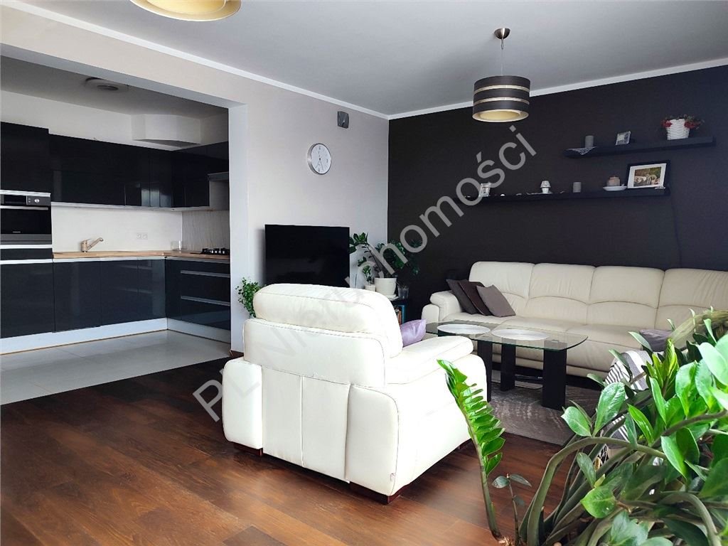 Zapraszam do 63 m² funkcjonalnego mieszkania z dużym balkonem w Książenicach Książenice  63m2 Foto 1