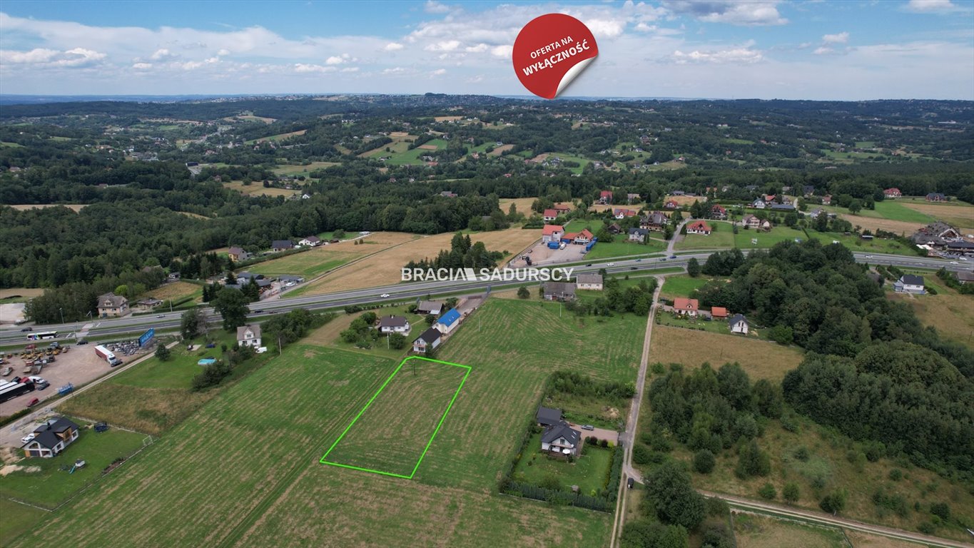 Działka budowlano-usługowa 27 a z dostępem do mediów Głogoczów  2 700m2 Foto 1