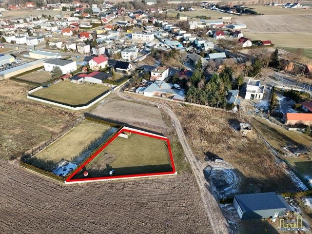 Działka budowlana w Tuchorzy z mediami i planem rozbudowy Tuchorza, Ogrodowa  1 026m2 Foto 1