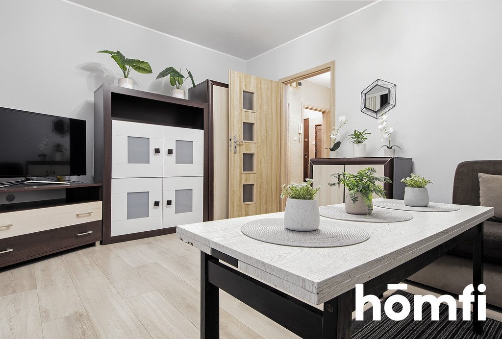 Jasne, oto propozycja tytułu:

"Nowoczesne 3-pokojowe mieszkanie z pięknym widokiem Poznań, Grunwald, Izaaka Newtona  55m2 Foto 1