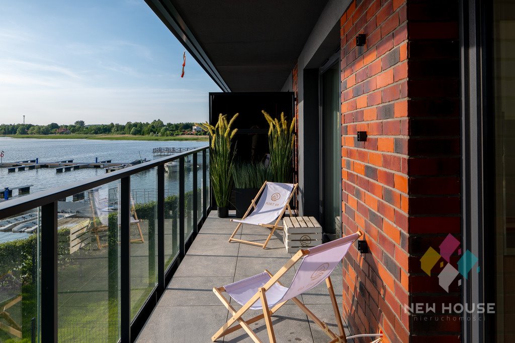 Sprzedam luksusowy apartament nad jeziorem z dostępem do plaży Ogonki, Sztynorcka  55m2 Foto 1