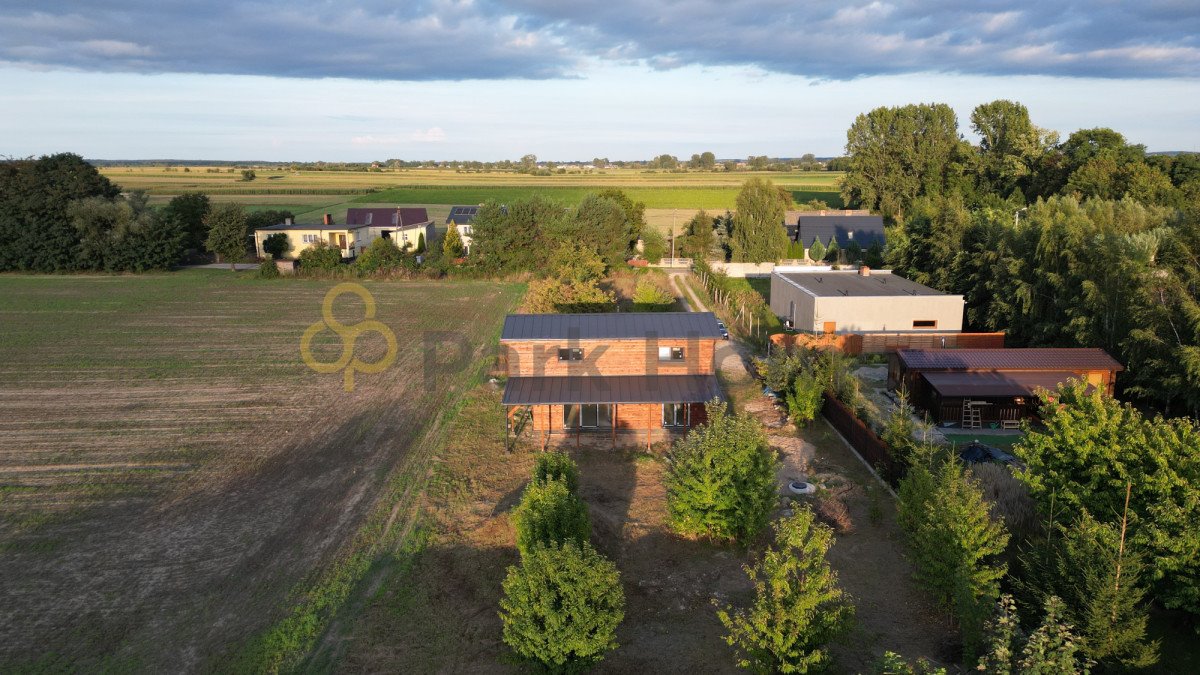 Drewniany dom w stylu western z dużym tarasem i ogrodem Kopaszewo  91m2 Foto 1