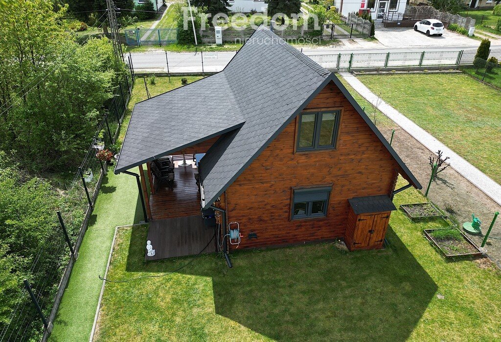 Zapraszam do obejrzenia drewnianego domku 70 m² z garażem i tarasem Kurnos Drugi  70m2 Foto 1