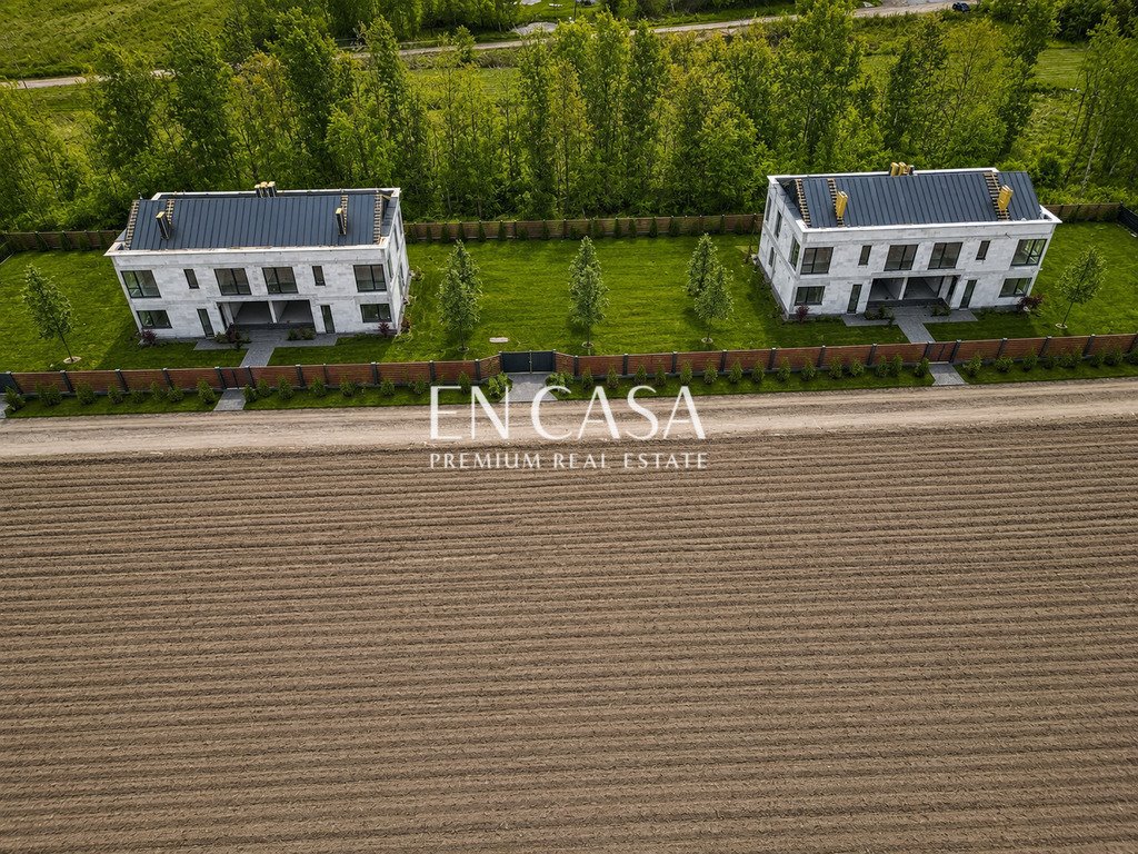 Nowoczesny dom 157 m² z dużymi przeszkleniami i garażem Pęcice, Źródlana  157m2 Foto 1