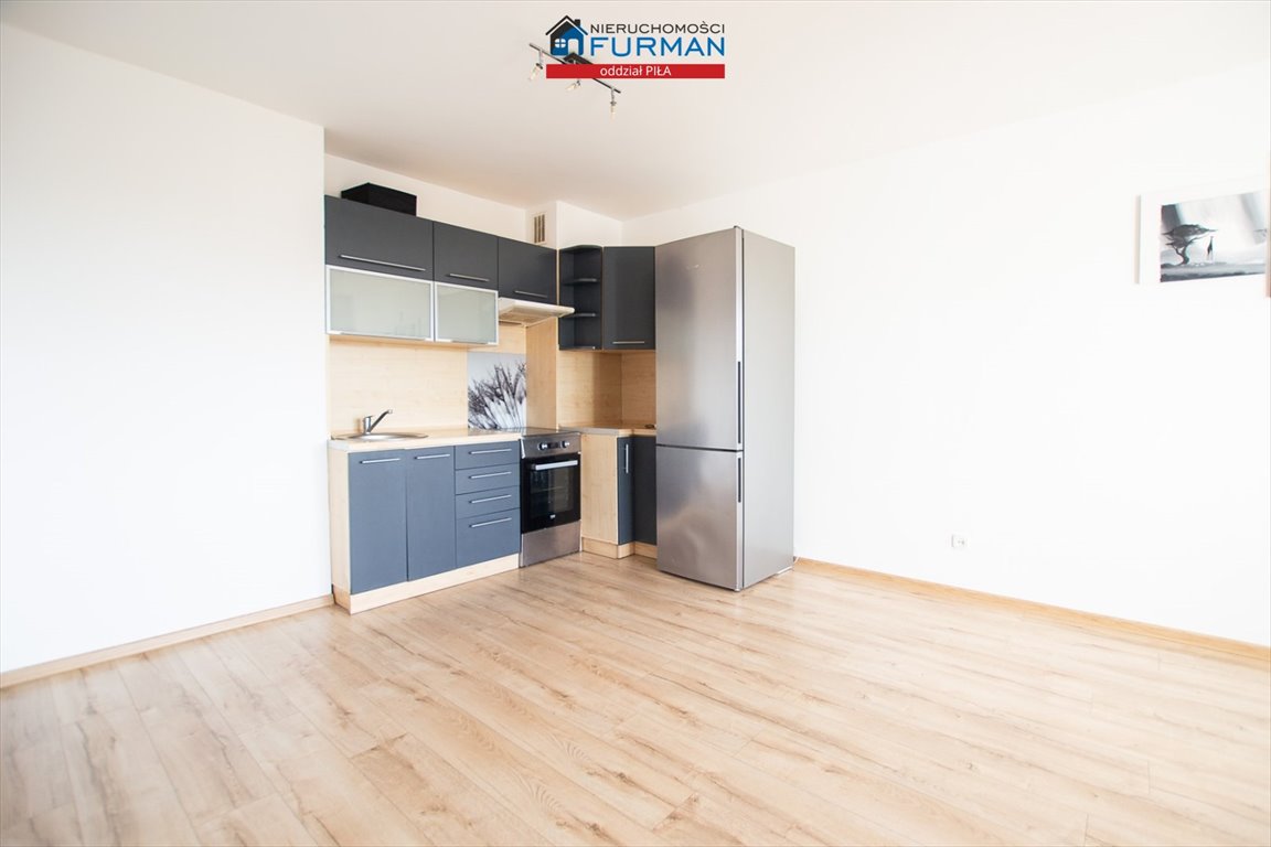 Przestronne 2 pokoje z balkonem, blisko usług i szkół Piła, Górne  40m2 Foto 1