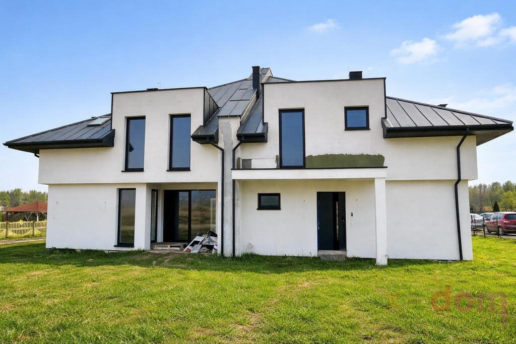 Nowoczesny dom 105 m² z niezależnymi lokalami i ogrodem Micigózd  105m2 Foto 1