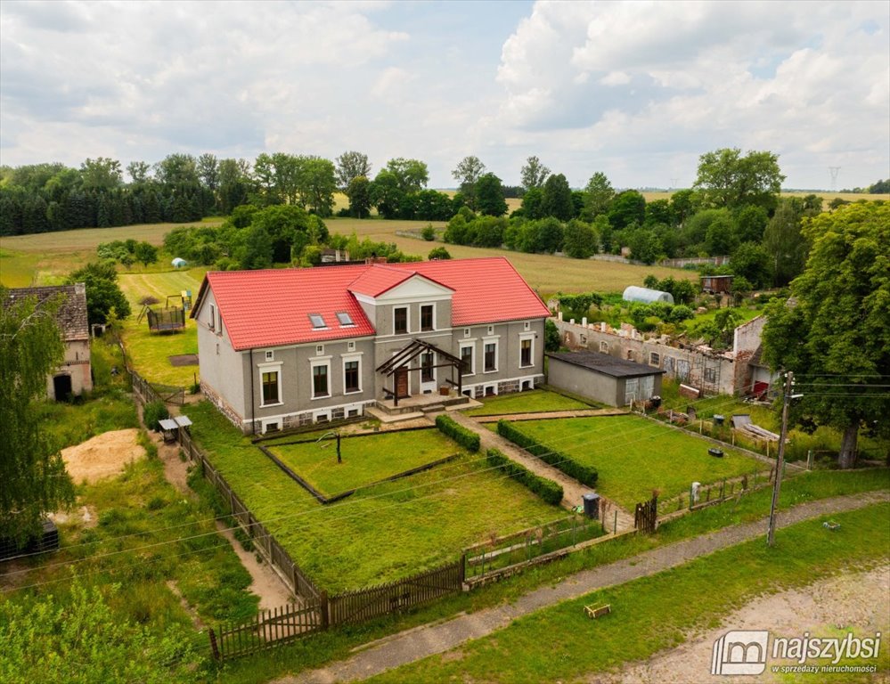 Przestronny dom z 7 pokojami, kominkiem i ujeżdżalnią Rogowo  448m2 Foto 1