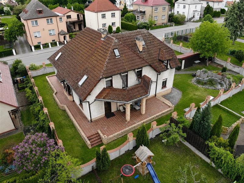 Przestronny dom 362 m² z ogrodem, garażem i możliwością działalności: Białogard: Kochanowskiego