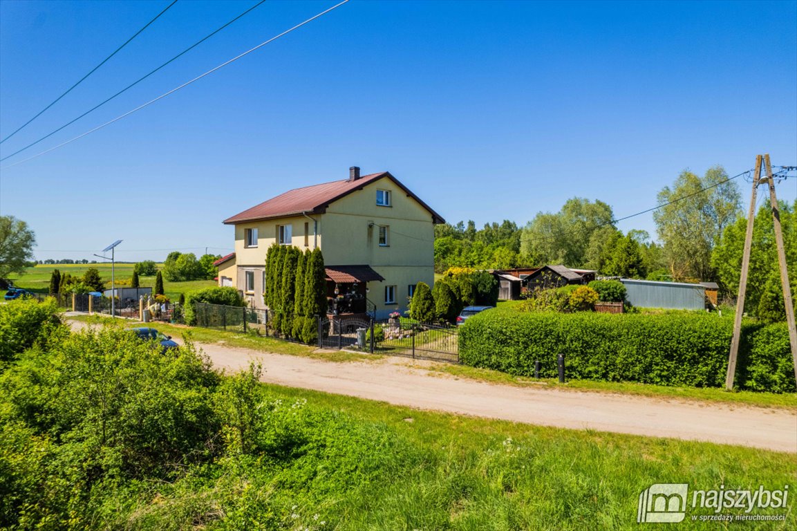 Dom z ogrodem i garażami w Tuczach, 103 m2 Tucze, centrum  103m2 Foto 1