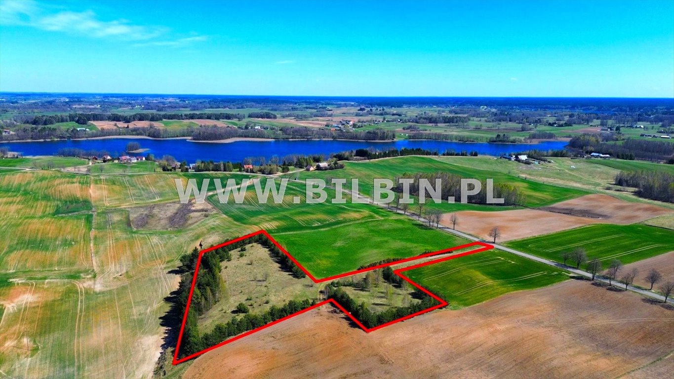 Działka z lasem i dostępem do jeziora Białe, 13 401 m² Białogóry  13 401m2 Foto 1