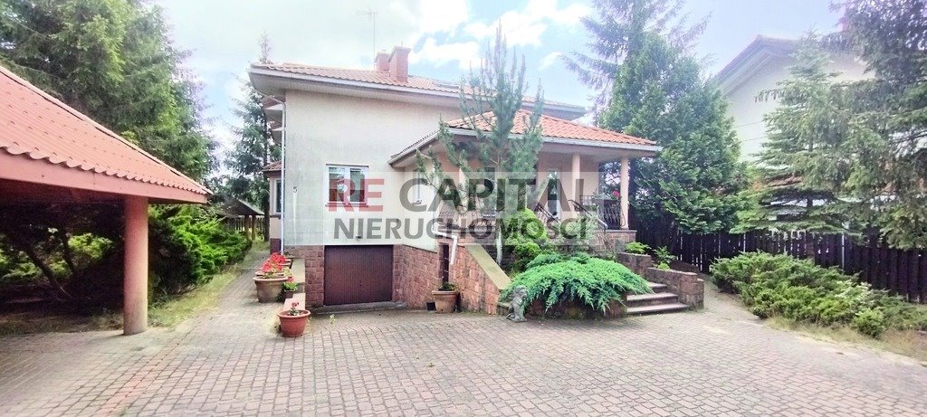 Ekskluzywny dom 254 m² z dębowymi elementami i funkcjonalnym układem Stare Babice, Dworkowa  254m2 Foto 1