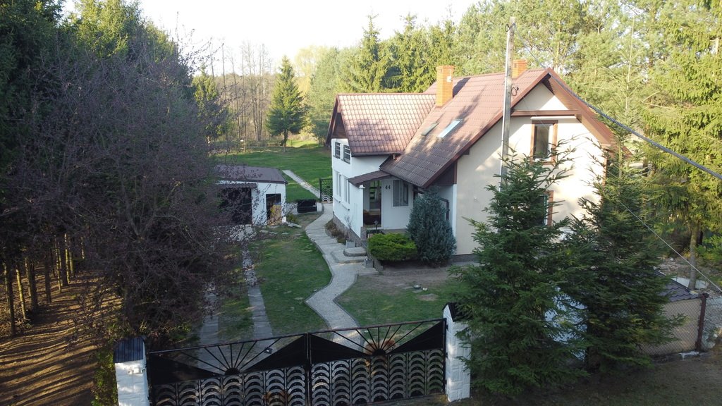 Do sprzedania przestronny dom 100 m² z dużą działką 10 000 m², stawem i dostępem do rzeki Barycz Stara  100m2 Foto 1