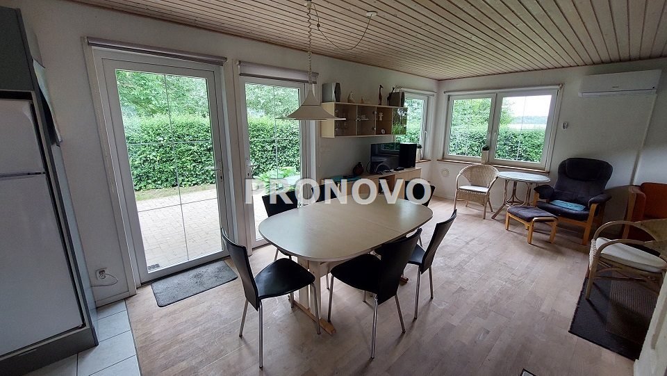 Sprzedam dom nad jeziorem Strzeszów z garażem i widokami Strzeszów  69m2 Foto 1