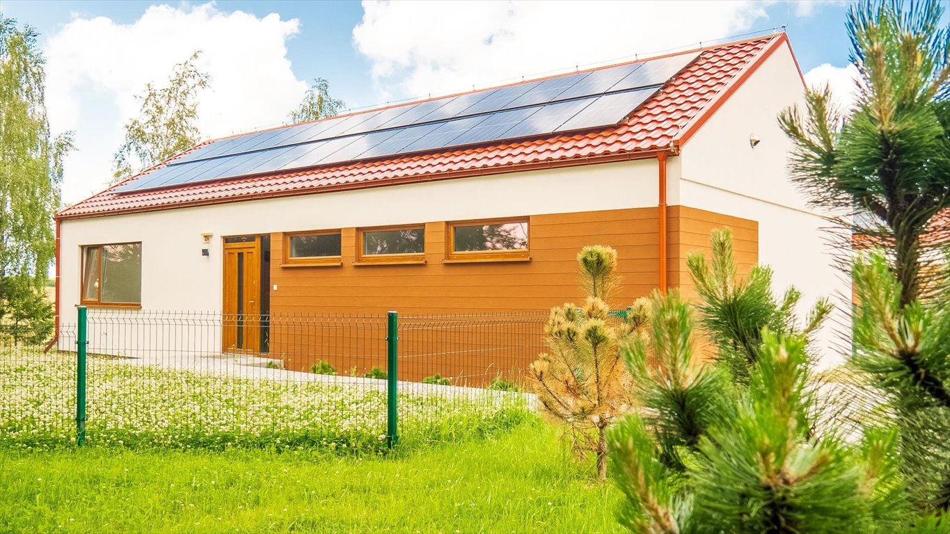 Nowoczesny energooszczędny dom 113 m2 z tarasem i patio Kukinka  113m2 Foto 1