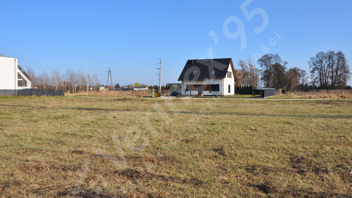 Działka budowlana na sprzedaż Dąbrowa  1 058m2 Foto 1