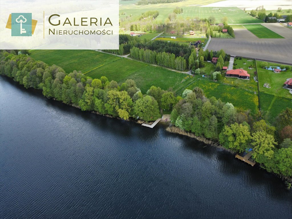 Działka nad jeziorem w Skarpie – cisza, las, plaża Miłomłyn  1 021m2 Foto 1
