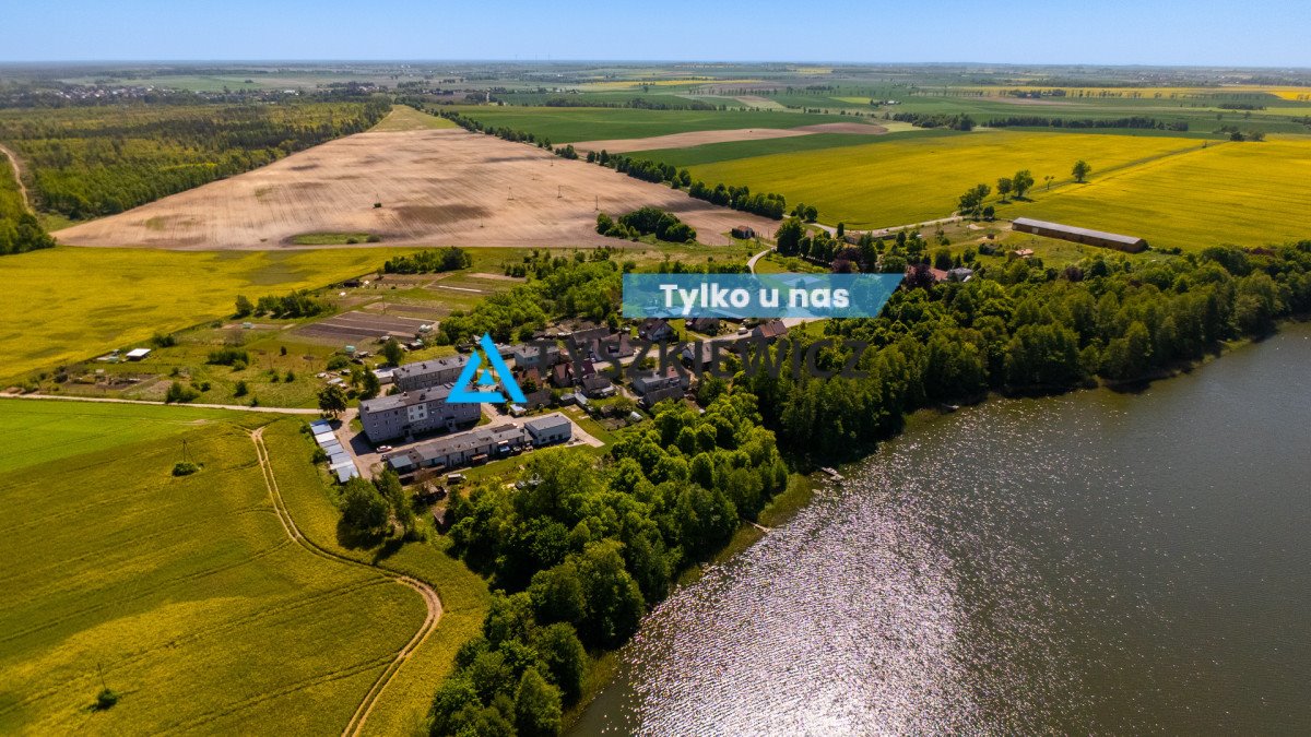 Dom nad jeziorem z działką i kominkiem w cenie Wysoka  95m2 Foto 1