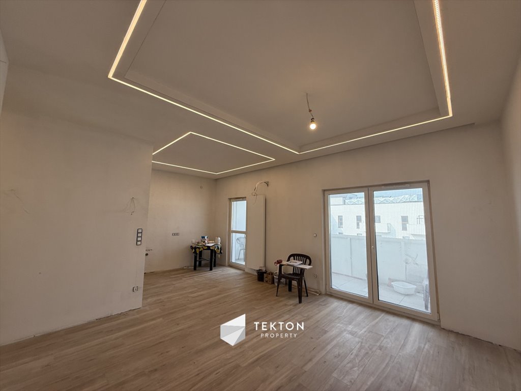 Do sprzedania przestronny 3-pokojowy apartament z loggią i wysokimi sufitami Poznań, Rataje, Milczańska  72m2 Foto 1