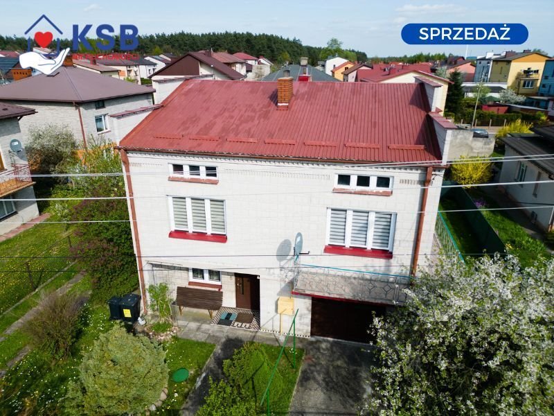 Zapraszam do obejrzenia zadbanego domu 135 m² z garażami i ogrzewaniem węglowym Ostrowiec Świętokrzyski, Kasztanowa  135m2 Foto 1