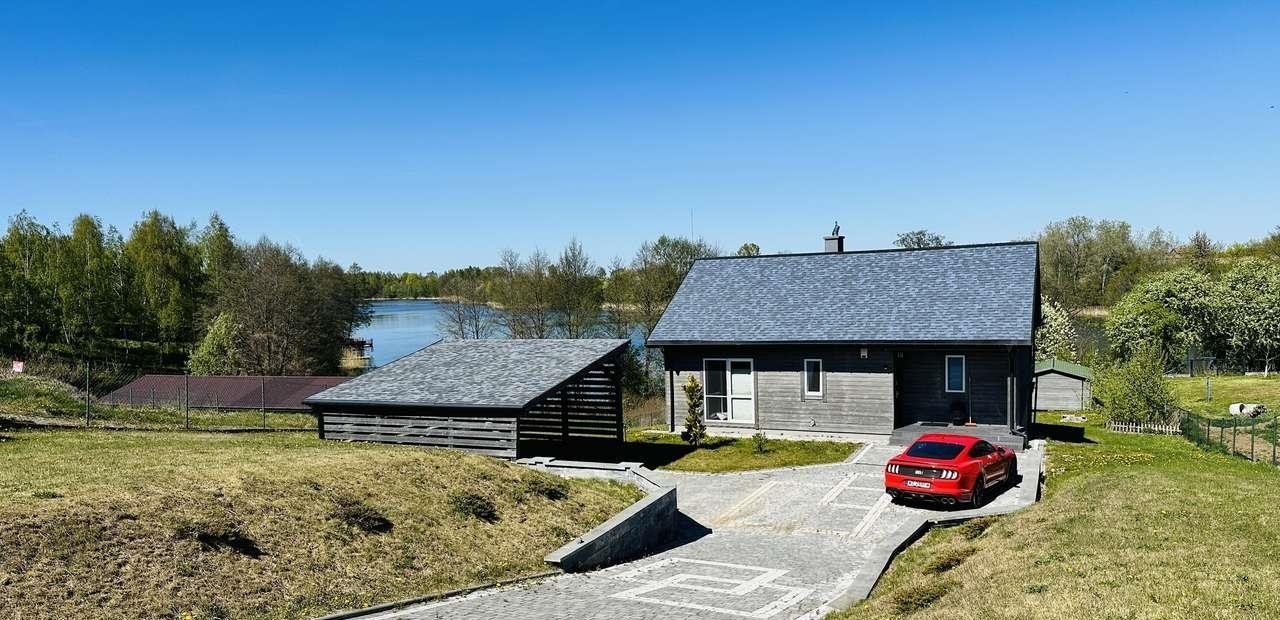 Dom nad jeziorem z własną linią brzegową polecam Gulbiny, Gulbiny 57i  76m2 Foto 1