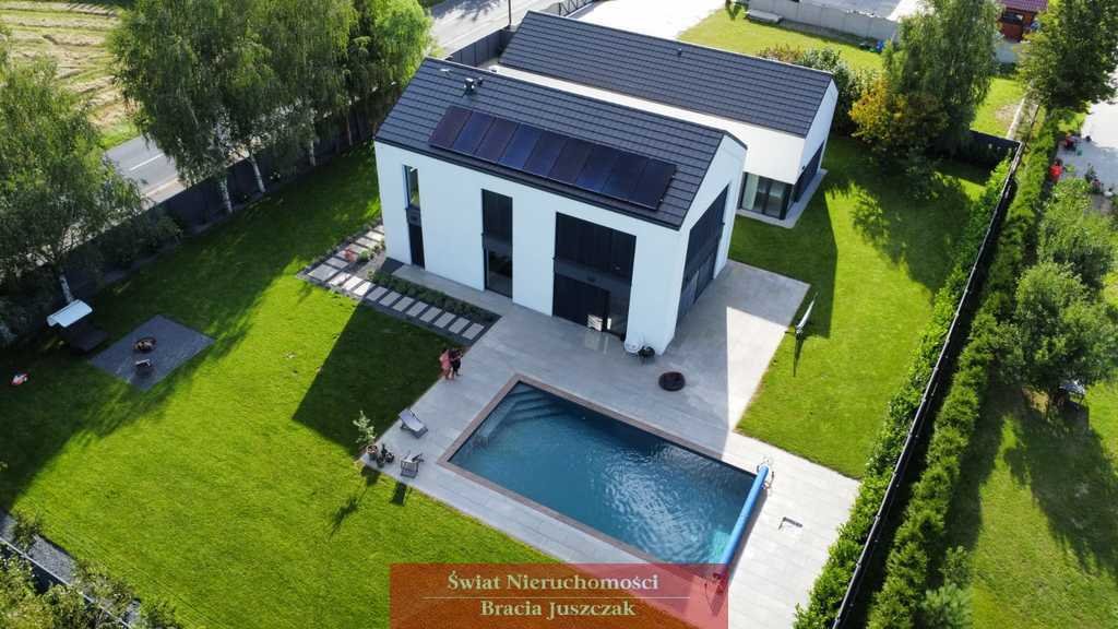 Nowoczesny dom w stylu stodoły, 6 pokoi, garaż 2 auta Uraz  339m2 Foto 1