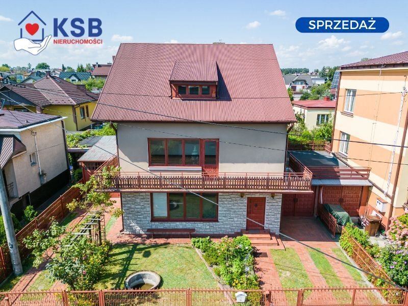 Przytulny dom z dwoma salonami, tarasem i garażami Ostrowiec Świętokrzyski, Rodzinna  182m2 Foto 1