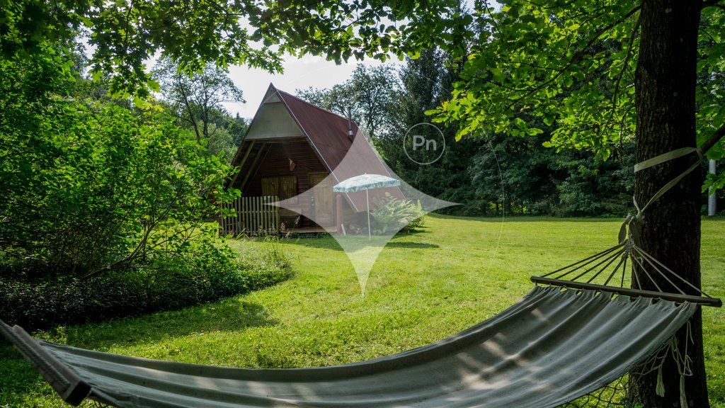 Działka z domkiem i strumieniem w Pisary, 2600 m² Pisary  2 600m2 Foto 1