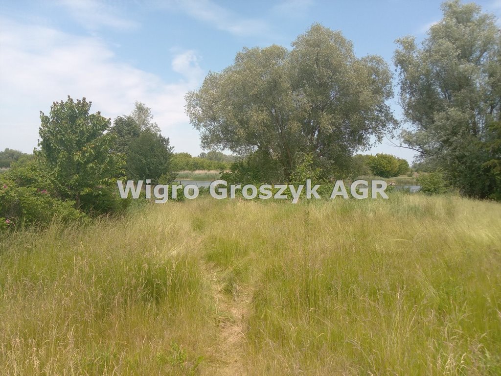 Dom z widokiem na Jeziorko Dziekanowskie – przestrzeń i potencjał Dziekanów Polski  340m2 Foto 1