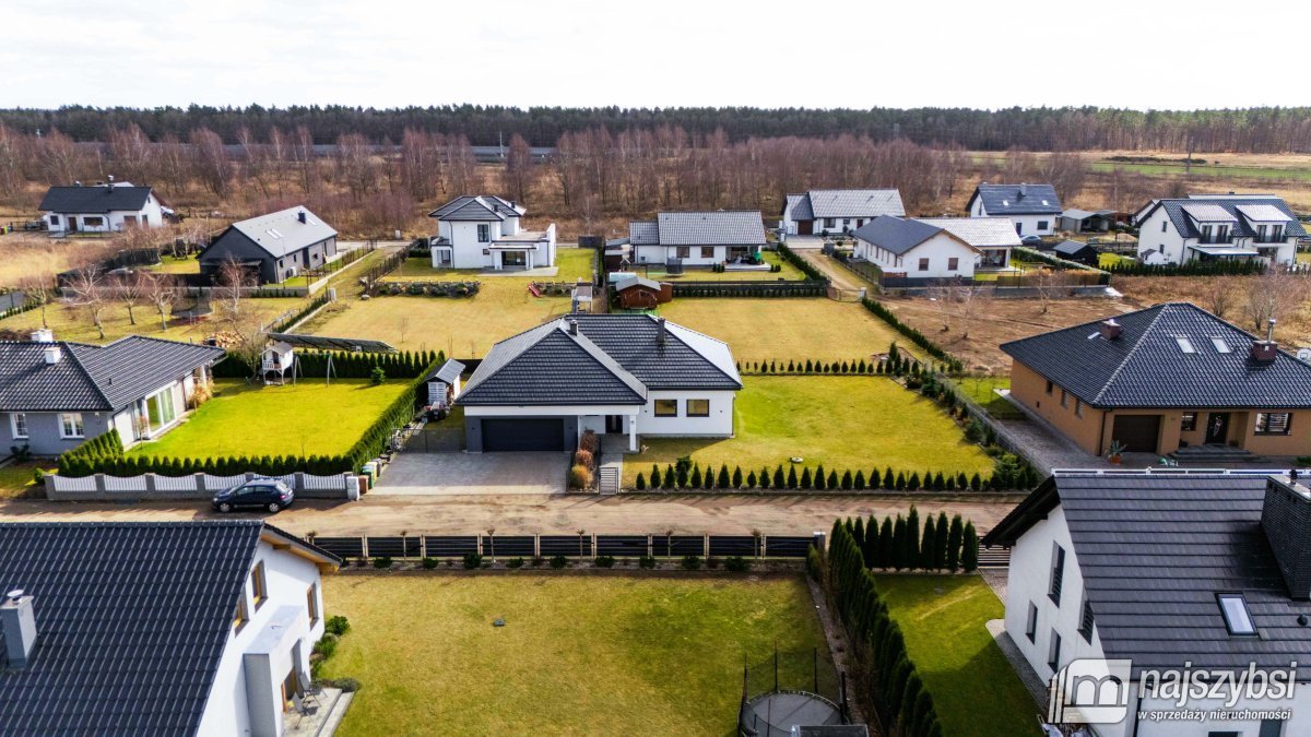 Zapraszam do obejrzenia nowoczesnego domu z garażem i kominkiem Nowogard  147m2 Foto 1