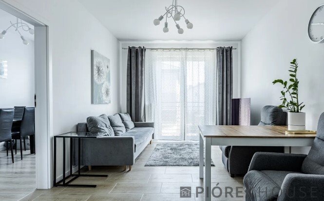 Przestronne 5-pokojowe mieszkanie z balkonem i miejscem na dwa auta Marki, Rysia  104m2 Foto 1