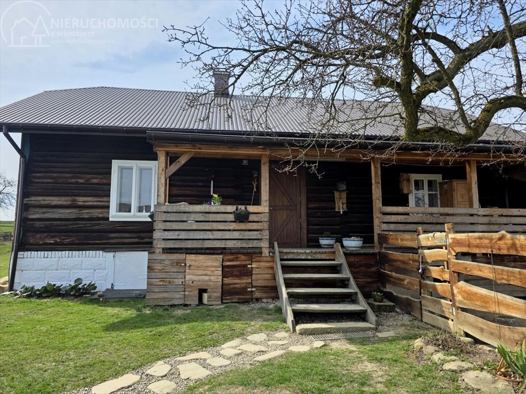Urokliwy drewniany dom 80 m2 z potencjałem w Moszczenicy Moszczenica  80m2 Foto 1