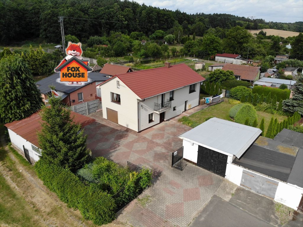 Urokliwy dom 90 m² z garażem i ogrodem w Iwinach Iwiny  90m2 Foto 1