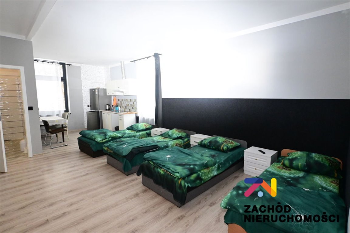 Wynajem domu z 21 łóżkami, kuchniami i patio Nowa Sól  230m2 Foto 1