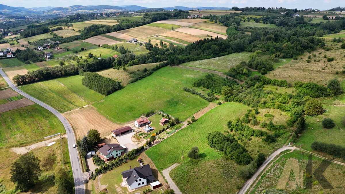 Działka budowlana na sprzedaż Naszacowice  1 100m2 Foto 1