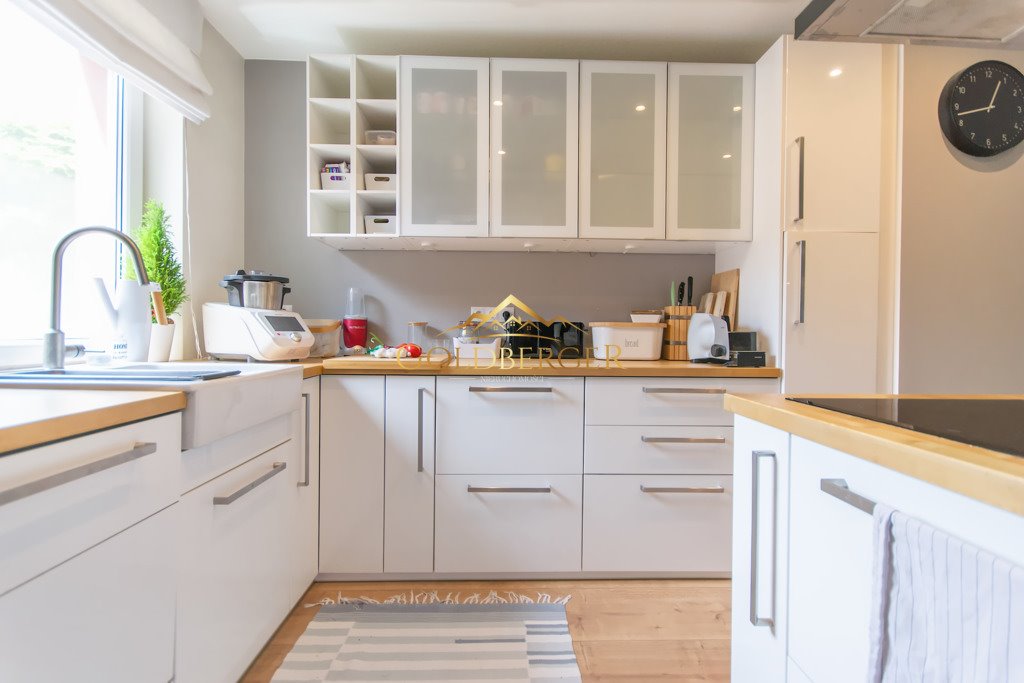 Dom z ogrodem w Komornikach (127,47 m², garaż) Komorniki, Jaśminowa  127m2 Foto 1