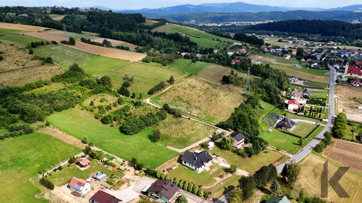 Działka budowlana na sprzedaż Naszacowice  1 500m2 Foto 1