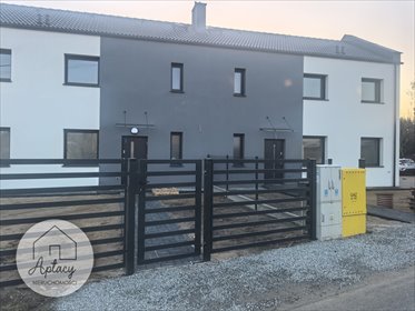 Nowoczesny dom bliźniak z ogrzewaniem podłogowym i tarasem dom Konarzewo, Młyńska